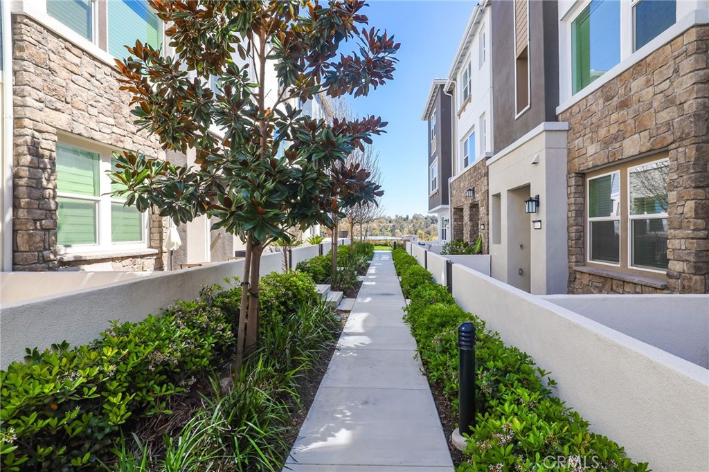 454 Palermo Lake Forest, CA 92630 - Photo 33 of 44 a view of a pathway with house on both side