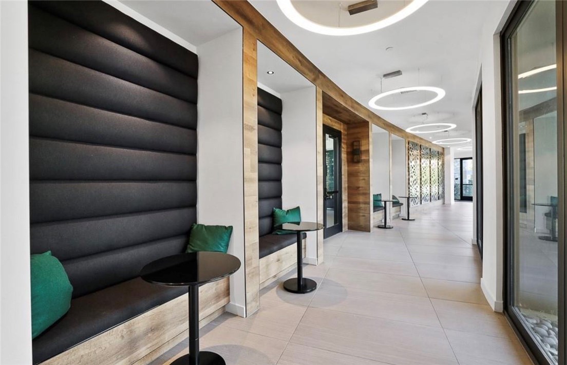 454 Palermo Lake Forest, CA 92630 - Photo 36 of 44 a living room with furniture and a potted plant