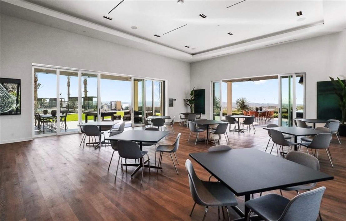 454 Palermo Lake Forest, CA 92630 - Photo 39 of 44 a view of a dining room with furniture and wooden floor