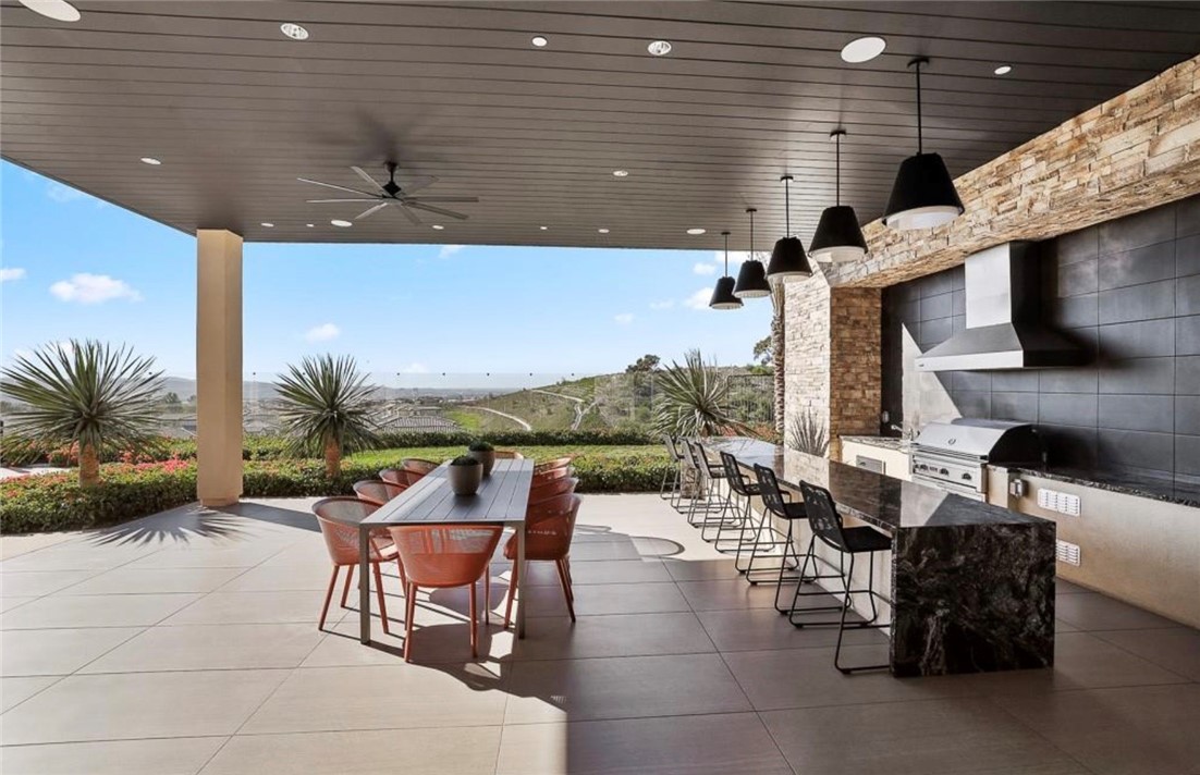 454 Palermo Lake Forest, CA 92630 - Photo 40 of 44 a outdoor space with lots of white furniture