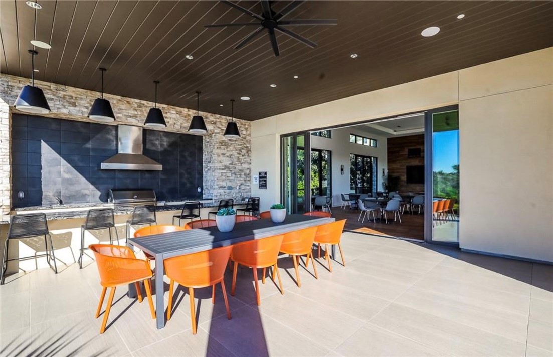 454 Palermo Lake Forest, CA 92630 - Photo 41 of 44 a view of a dining hall with furniture and chandelier