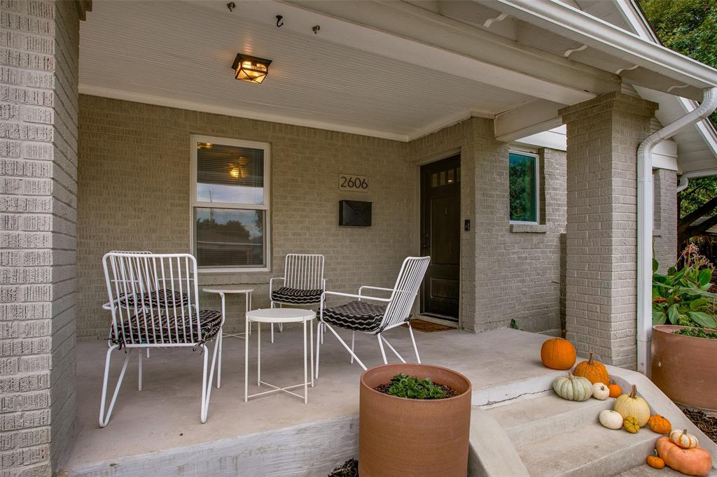 2606 West 12th Street Dallas, TX 75211 - Photo 5 of 36 a view of a patio with couple of chairs