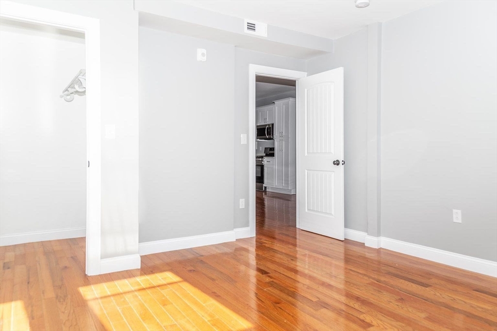 16 Gaston Street, Unit 2F Boston, MA 02121 - Photo 4 of 7 a view of an empty room