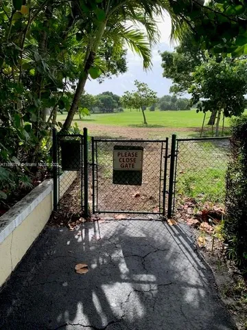 a view of a garden with an outdoor space