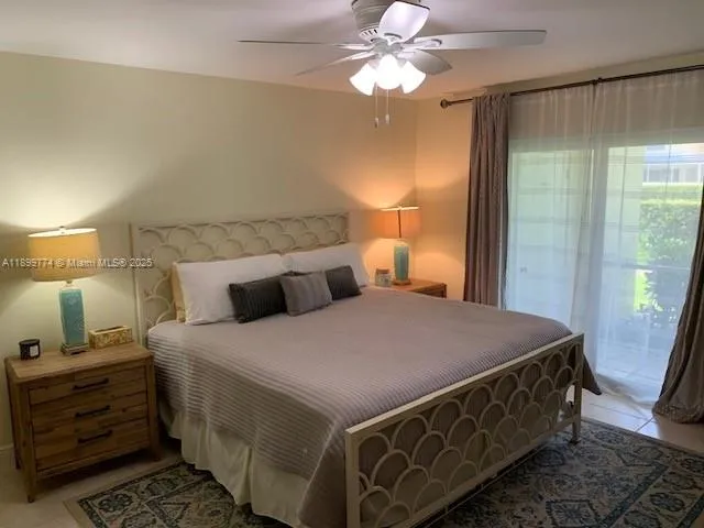 a bed room with a bed and a window