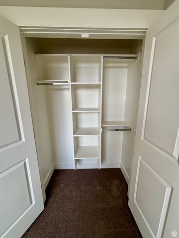 1184 West 3250 North Ogden, UT 84414 - Photo 42 of 69 Integrated closet system featuring multiple shelves and hanging rods