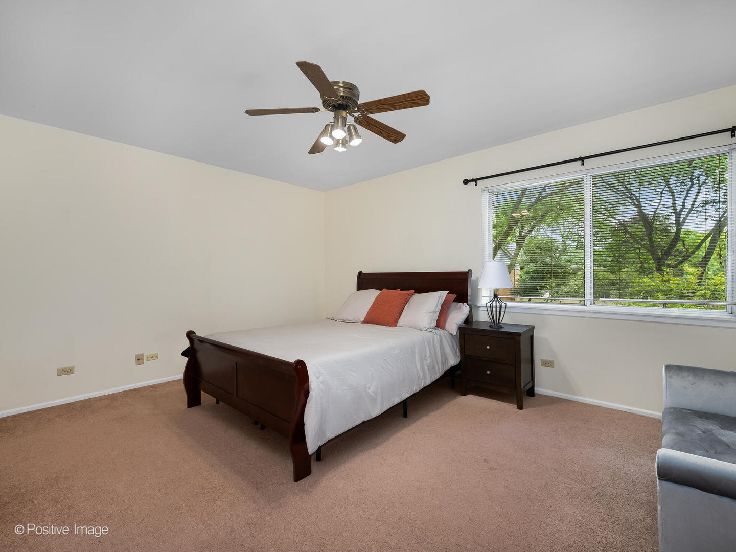 2407 South Goebbert Road, Unit G202 Arlington Heights, IL 60005 - Photo 14 of 17 a spacious bedroom with a bed and window