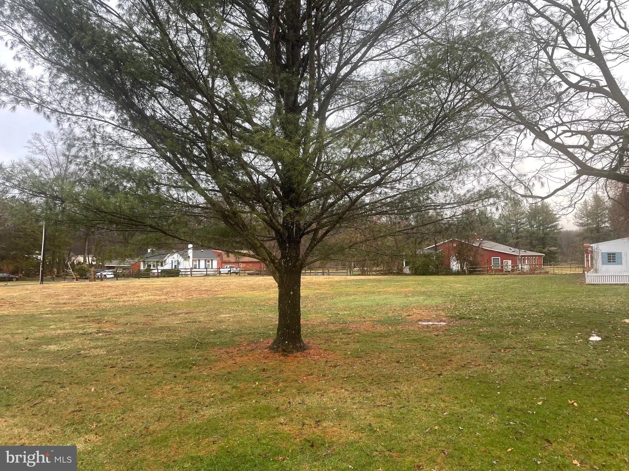 57 Diverty Road Pennington, NJ 08534 - Photo 4 of 5 a view of an ocean with trees in the background