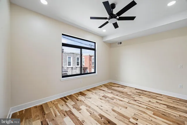 a view of a livingroom with a ceiling fan