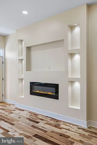 a view of a livingroom with wooden floor