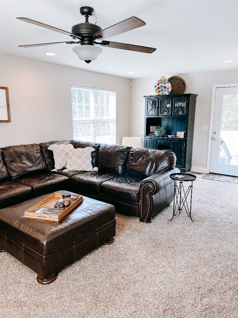827 Oslo Road Mount Juliet, TN 37122 - Photo 20 of 25 a living room with furniture a ceiling fan and a window