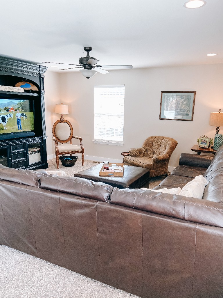 827 Oslo Road Mount Juliet, TN 37122 - Photo 21 of 25 a living room with furniture and a flat screen tv