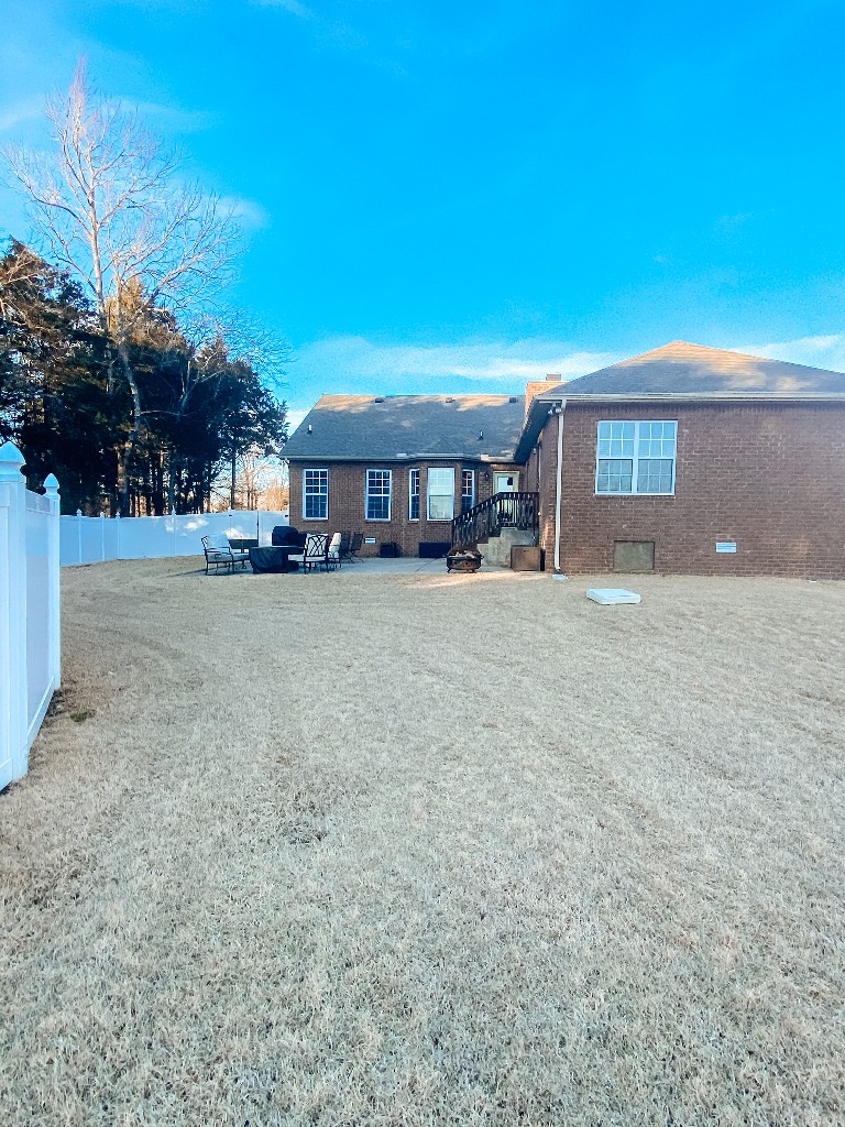 827 Oslo Road Mount Juliet, TN 37122 - Photo 25 of 25 a view of a house with a yard and tree s