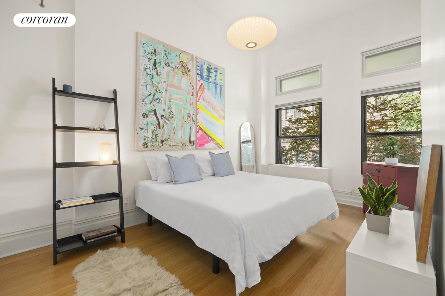 56 West 71st Street, Unit 2A Manhattan, NY 10023 - Photo 11 of 17 a bedroom with a bed and a window