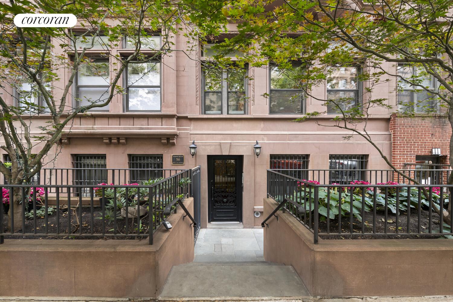 56 West 71st Street, Unit 2A Manhattan, NY 10023 - Photo 15 of 17 a front view of a building with a garden