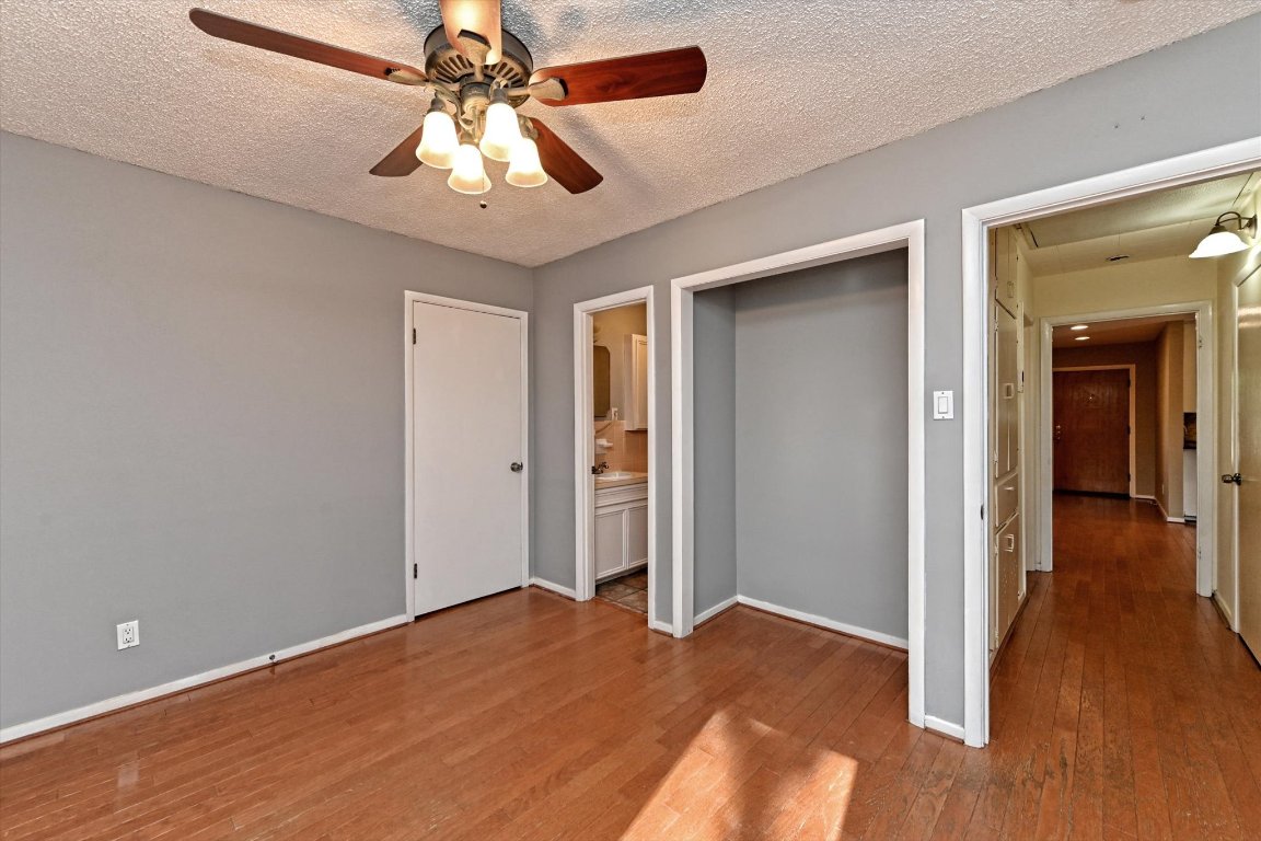 5205 Brookdale Lane Austin, TX 78723 - Photo 13 of 22 a view of a livingroom with a chandelier fan