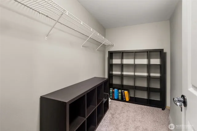 a hallway with cabinets
