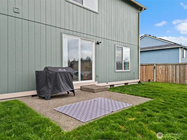 a view of backyard with cabin