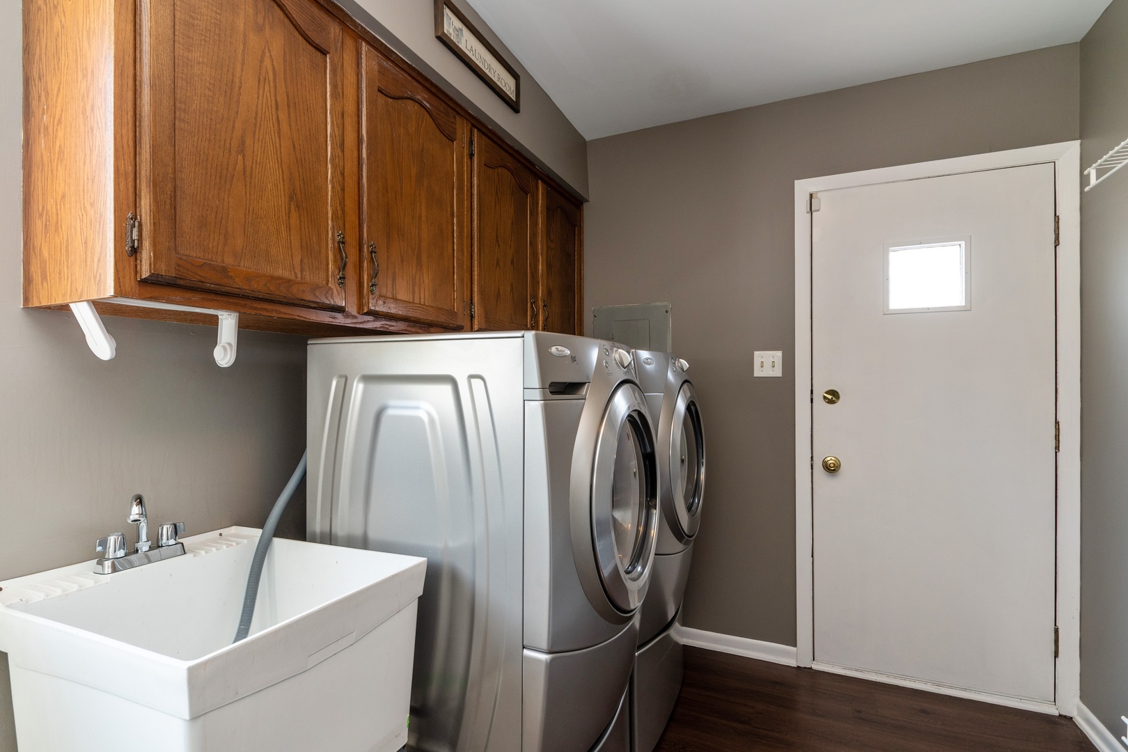 16046 Eagle Ridge Drive Tinley Park, IL 60477 - Photo 12 of 14 a utility room with dryer and washer