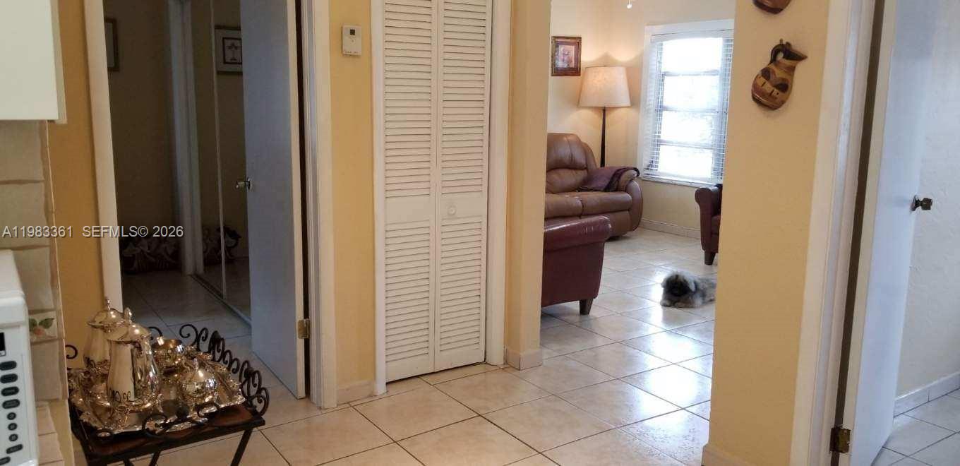 2787 Southwest 34th Court Miami, FL 33133 - Photo 14 of 15 a view of a bedroom from a hallway