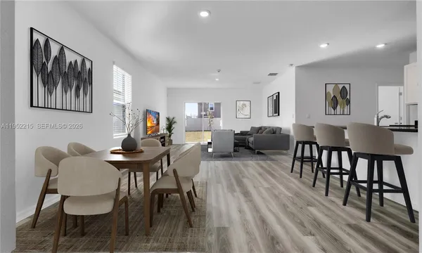 a living room with furniture and a table