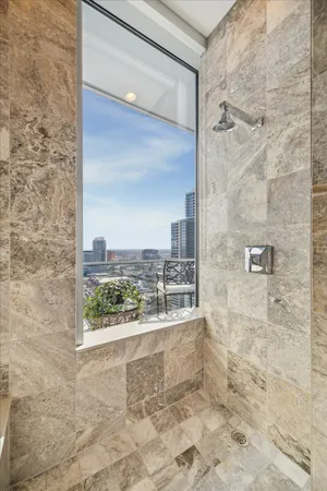 a view of a bathroom with shower