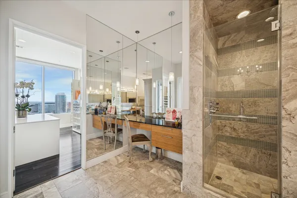 a room with lots of counter space and windows