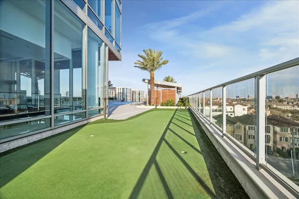 a view of a swimming pool with a lounge chairs