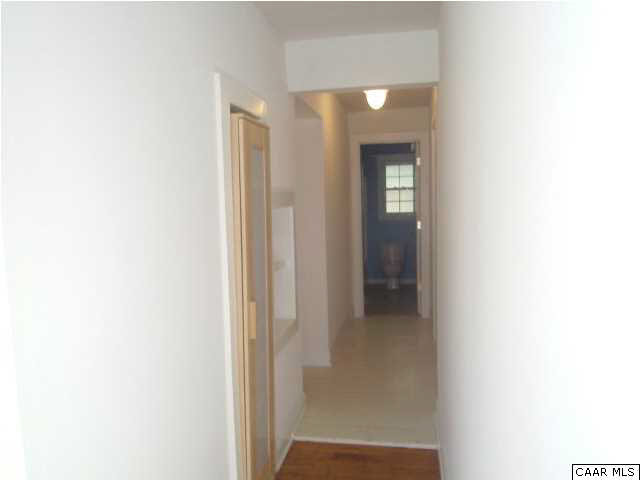 4215 Oak Hill Road Buckingham, VA 23921 - Photo 3 of 9 a view of a hallway with wooden floor