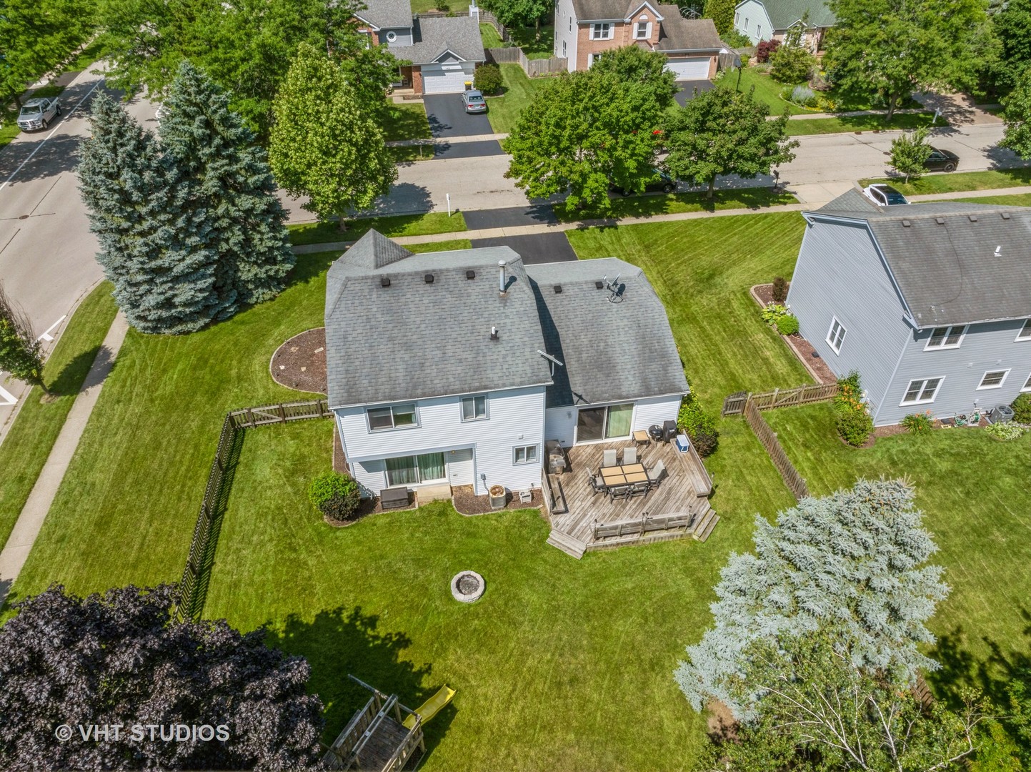 411 Ashfork Trail Cary, IL 60013 - Photo 17 of 25 an aerial view of a house with a garden