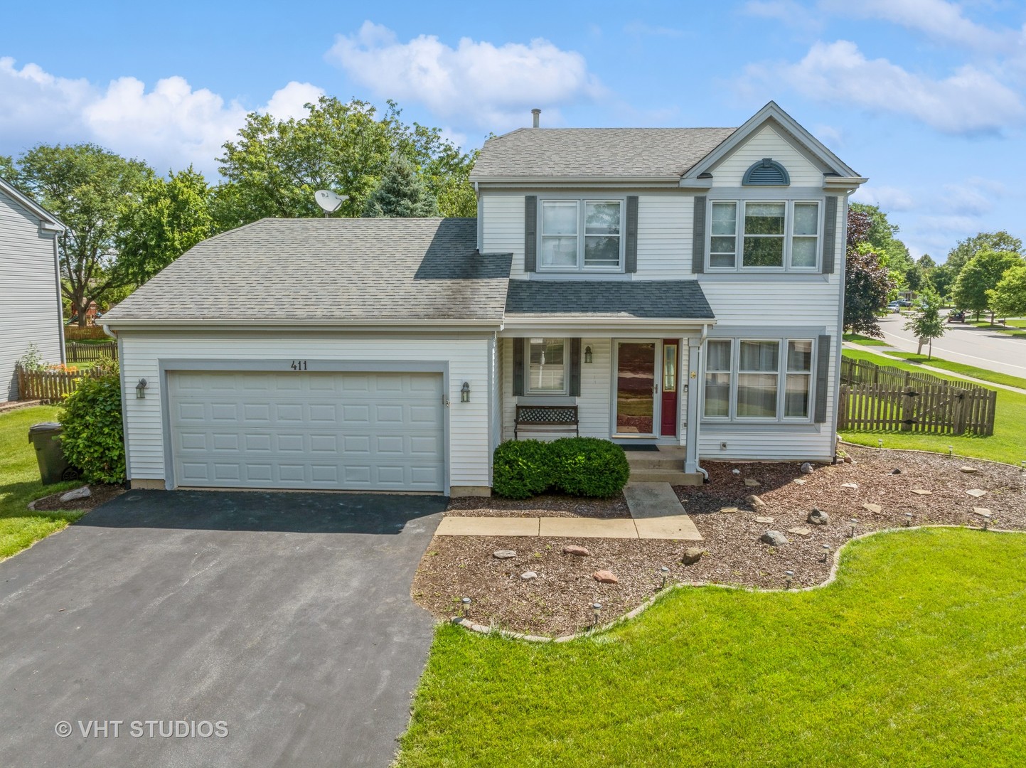 411 Ashfork Trail Cary, IL 60013 - Photo 2 of 25 front view of a house with a yard