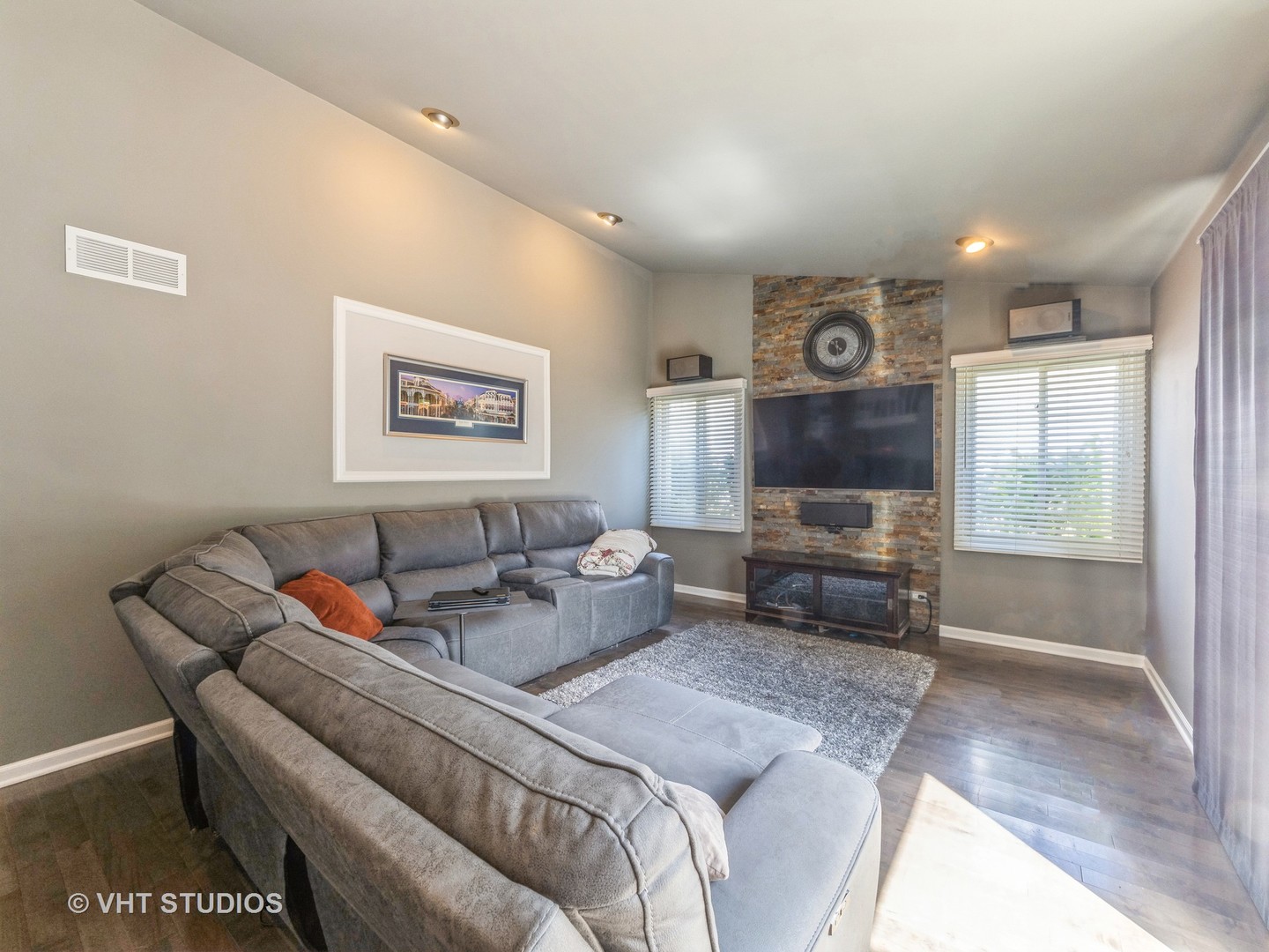 411 Ashfork Trail Cary, IL 60013 - Photo 3 of 25 a living room with furniture and a flat screen tv