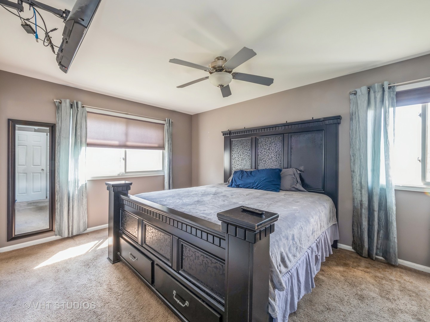 411 Ashfork Trail Cary, IL 60013 - Photo 6 of 25 a bedroom with a bed and a window