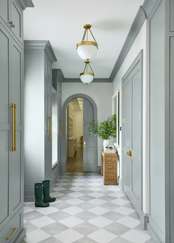 a view of entryway with a flower pot and a chandelier