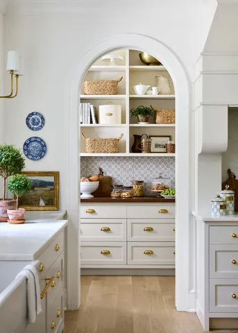 a kitchen with a cabinets and a stove