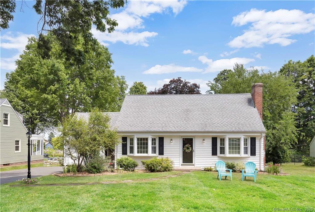 860 Ridge Road Wethersfield, CT 06109 - Photo 1 of 1 front view of house with a yard