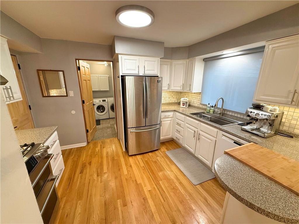 50 Philander Street Pittsburgh, PA 15218 - Photo 15 of 44 a kitchen with a sink appliances and cabinets