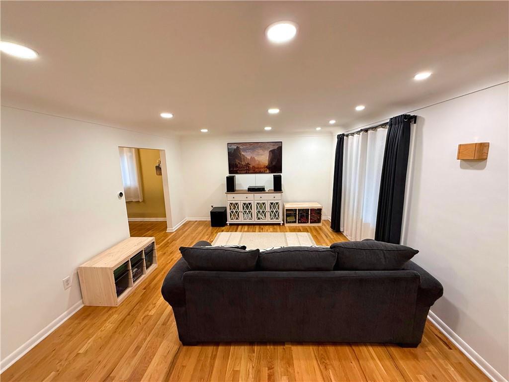 50 Philander Street Pittsburgh, PA 15218 - Photo 8 of 44 a living room with furniture and a flat screen tv