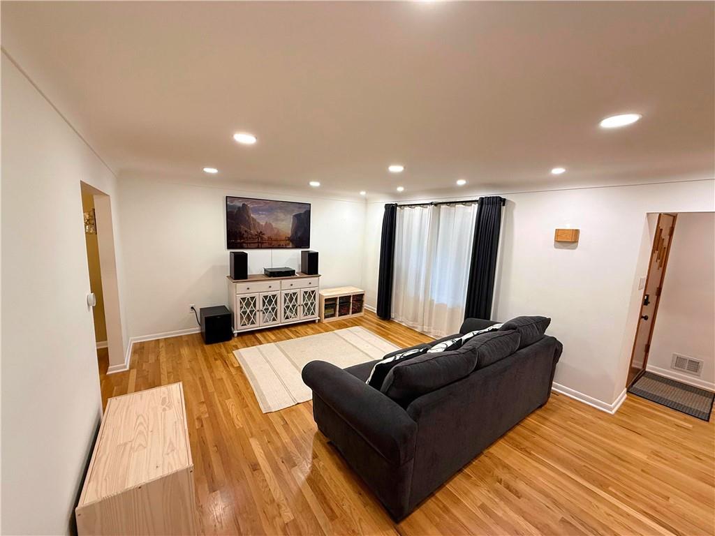 50 Philander Street Pittsburgh, PA 15218 - Photo 9 of 44 a living room with furniture and a flat screen tv