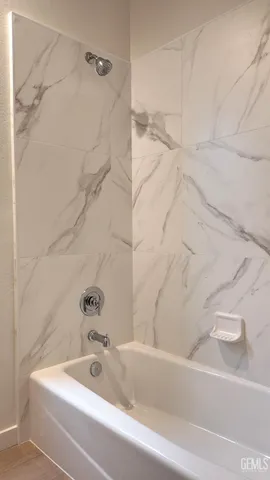 a bathroom with a bathtub