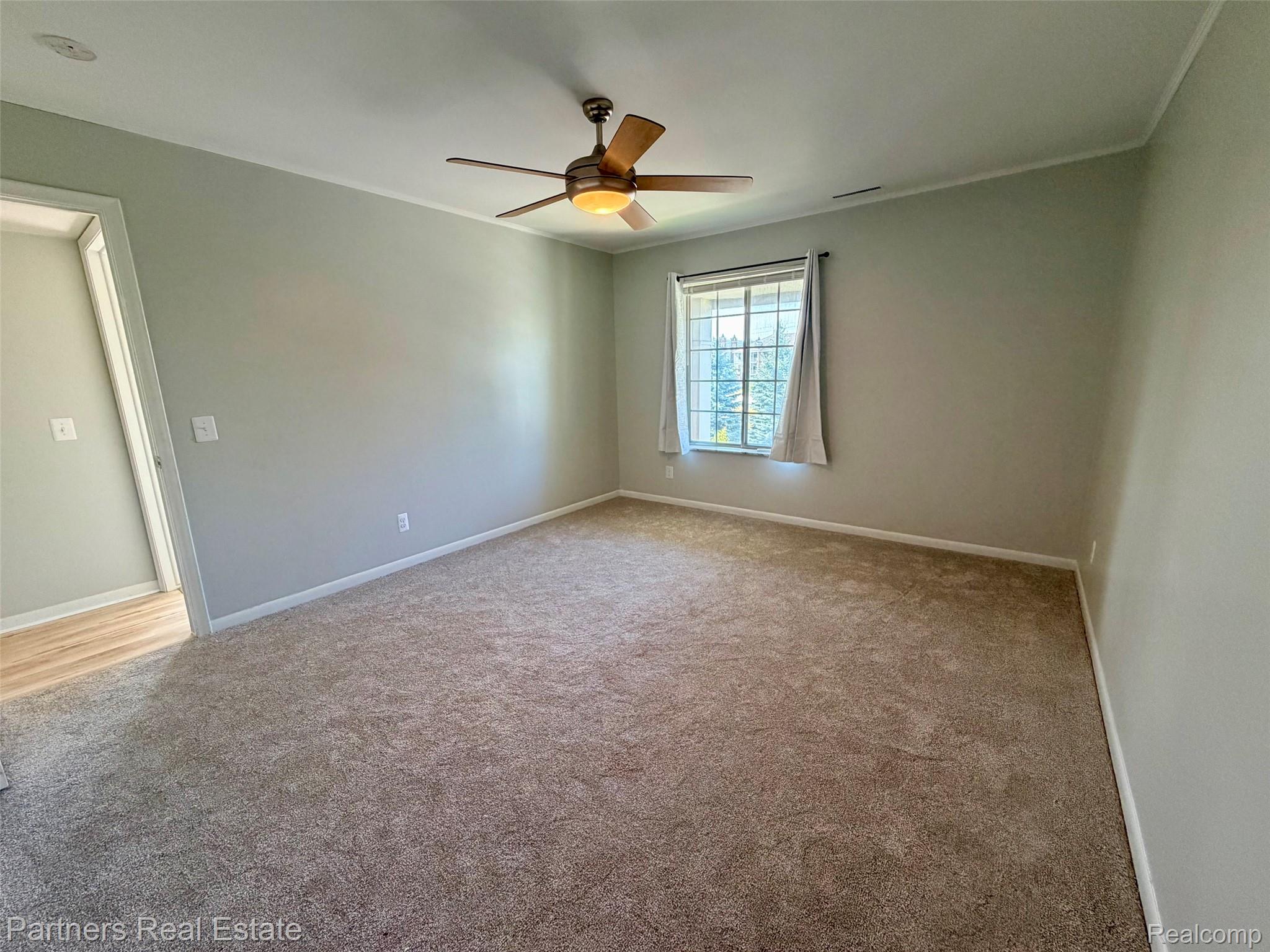 507 West Highland Road, Unit 11 Howell, MI 48843 - Photo 23 of 29 Primary Bedroom