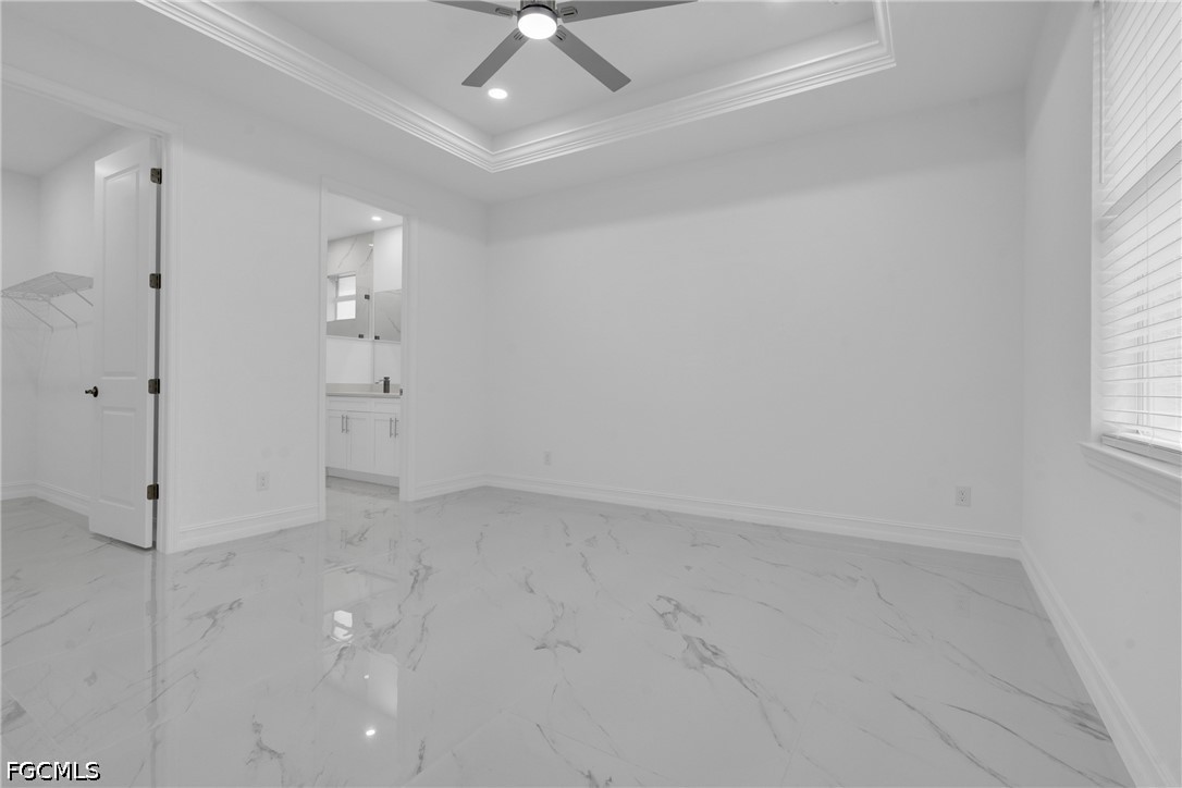 2115 Polar Avenue Alva, FL 33920 - Photo 16 of 26 an empty room with a ceiling fan and window