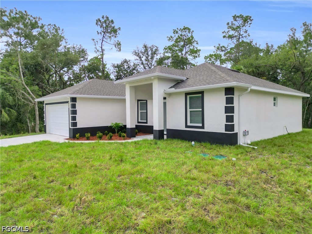 2115 Polar Avenue Alva, FL 33920 - Photo 4 of 26 a view of a house with backyard