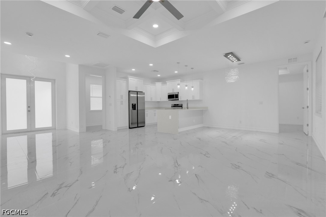 2115 Polar Avenue Alva, FL 33920 - Photo 7 of 26 a view of an empty room with a kitchen