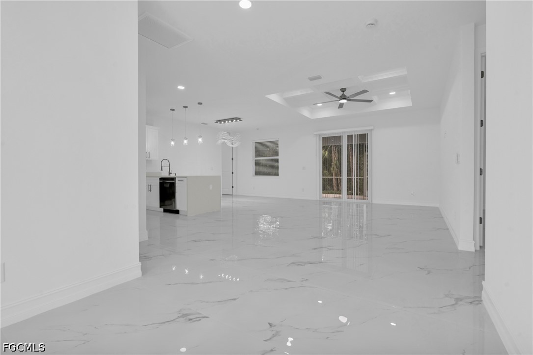 2115 Polar Avenue Alva, FL 33920 - Photo 8 of 26 a view of a kitchen with a sink and a refrigerator