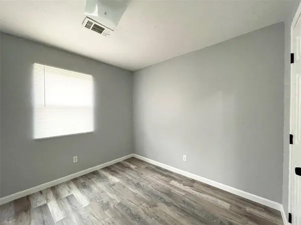 a view of a room with a window