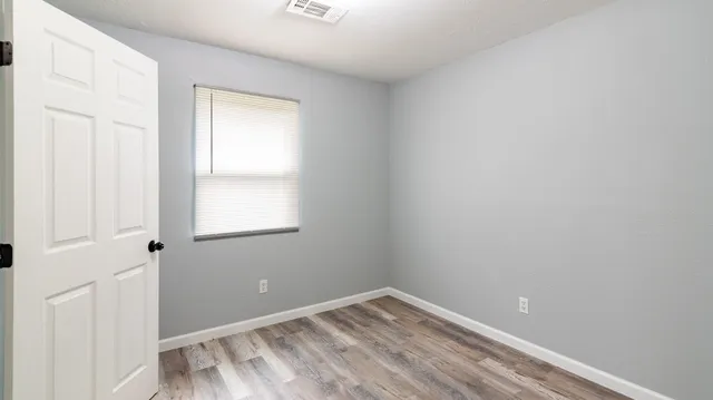 a bathroom with a toilet a sink and bathtub