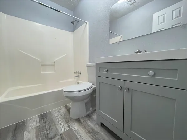 a view of a lake with a yard