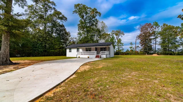 a view of an outdoor space and swimming pool