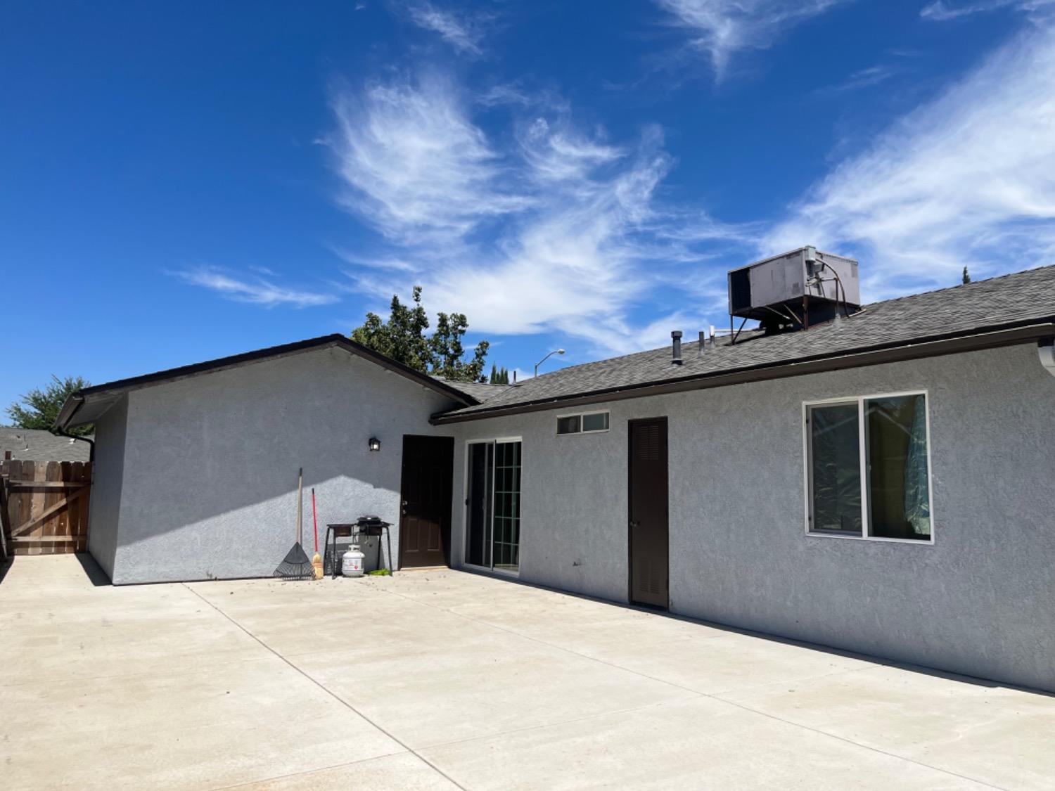 1978 Cline Street Firebaugh, CA 93622 - Photo 3 of 9 a view of a house with a backyard space